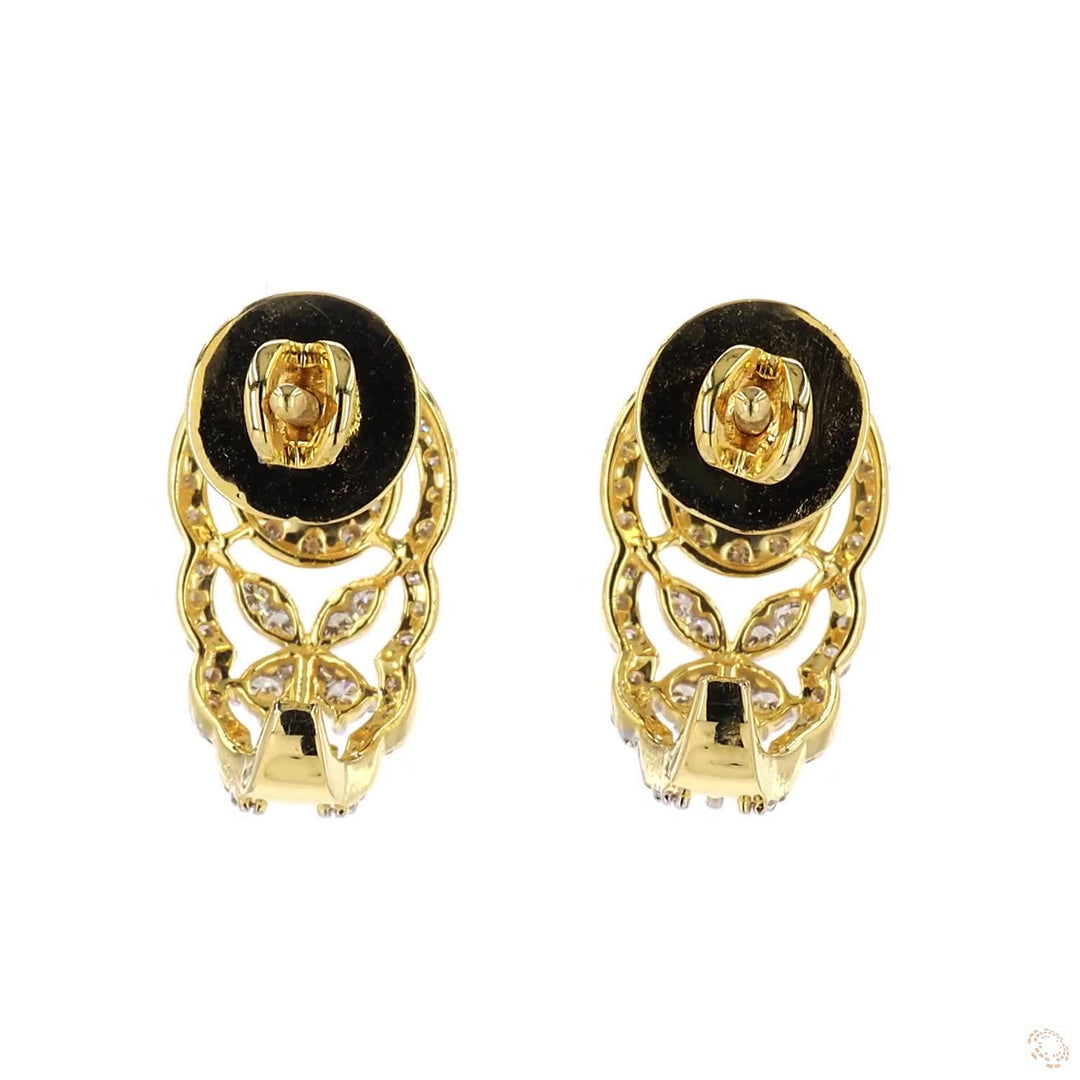 Golden Vine: Intricate Leaf Motifs in Yellow Gold and Diamonds